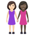 👩🏻‍🤝‍👩🏿 women holding hands: light skin tone, dark skin tone display on JoyPixels